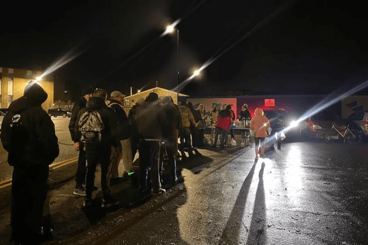 0_FeedFenlandinWisbechQueue - News for Peterborough and Cambridgeshire News for Peterborough and Cambridgeshire - A queue for food at Feed Fenland: On the 8th of February 2025, 7 volunteers from Feed Fenland and Wisbech Street Supplies will sleep on the streets of Wisbech to raise money for the homeless.