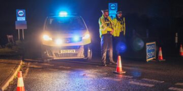 Police block the North Bank, Whittlesey, tonight as they conduct a search for a missing man. PHOTO: Terry Harris