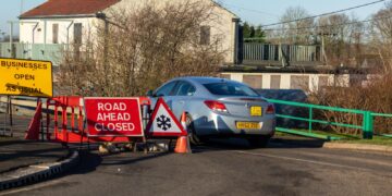 Fed up motorists are using local knowledge – some say commonsense – to continue to use the North Bank road near Whittlesey despite closure measures put in place because of flooding. PHOTO: CambsNews
