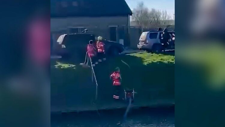 ramsey 6 - News for Peterborough and Cambridgeshire News for Peterborough and Cambridgeshire - Grainy photos taken from a video made by an onlooker of the incident at Ramsey involving fire crews and travellers. The video is being edited by CambsNews for release later today.