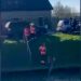ramsey 6 - News for Peterborough and Cambridgeshire News for Peterborough and Cambridgeshire - Grainy photos taken from a video made by an onlooker of the incident at Ramsey involving fire crews and travellers. The video is being edited by CambsNews for release later today.