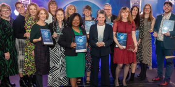 Spotlight Award winners pose with their awards - image credit to Cambridgeshire County Council.