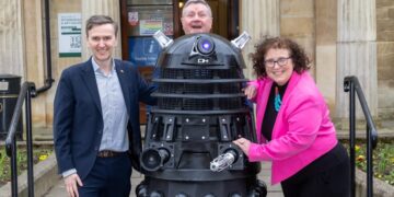 Let the magic begin. MP Andrew Pakes, city council leader Dennis Jones and Cllr Anna Smith, deputy mayor of the Cambridgeshire and Peterborough Combined Authority, were together at Peterborough Museum as early preparations for this summer’s major exhibition – Adventures in Time and Space – got under way. And of course, a Dalek made an impromptu appearance. PHOTO: Terry Harris