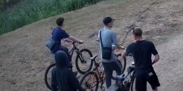 Police have released CCTV images of four people they wish to speak to in connection with an arson attack when several huts at the Flag Fen Bronze Age Centre in The Droveway, Northey Road, Peterborough, were deliberately set alight just before 10pm on 13 July