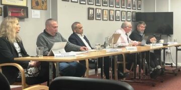 Photo courtesy of Fenland Community Radio Newsroom, reporting in February: “The monthly meeting of the Full Whittlesey Town Council was held last night. A packed public gallery of 25 started the evening but 18 walked out in protest after witnessing a verbal attack by one councillor on another regarding the use of the tennis courts at the Manor Centre”.