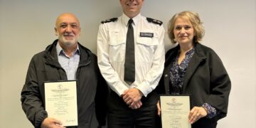 Luigi and Tina receiving their RHS certificates from Detective Chief Superintendent Jon Hutchinson.