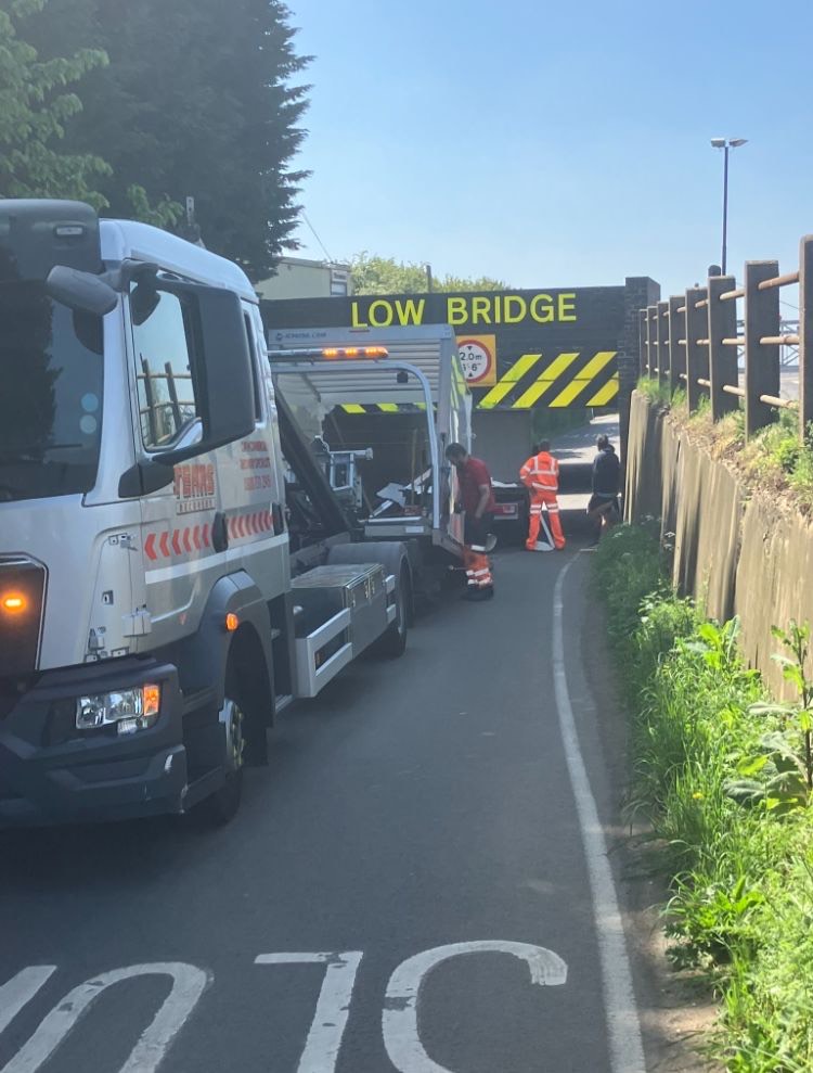 stonea 6 - News for Peterborough and Cambridgeshire Vehicles approaching the bridge on the B1098 at Stonea from the north or south must contend with a low railway bridge — an underpass notorious for collisions with traffic, often vans. To one side lies a level crossing where road traffic must stop for passing trains. Between the bridge, the crossing, and the riverbank running alongside, the site is a knot of potential hazards.