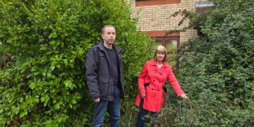 Image shows Cllr Mark Inskip and Cllr Christine Colbert at a property in East Cambridgeshire that has been empty for over thirteen years.