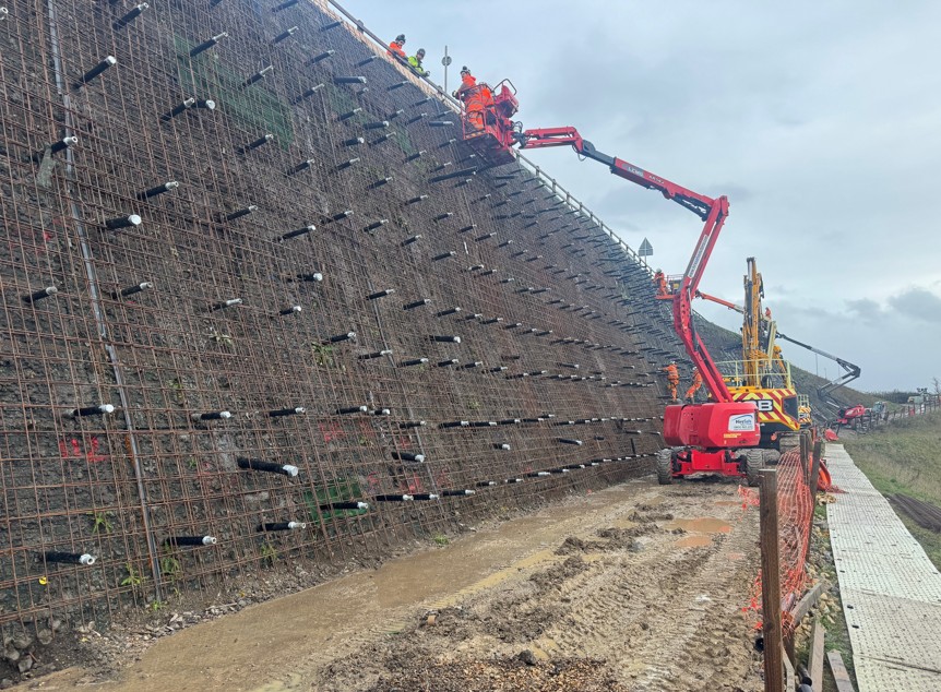 In a hard-edged update published today (Thursday) the council revealed that Jones Bros—the contractor responsible for the repair programme—has fallen behind schedule due to extended soil-nailing works and a late start to the crucial sprayed-concrete phase. Updated photo of work in progress from Cambridgeshire County Council