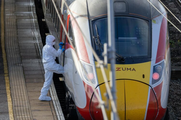 News for Peterborough and Cambridgeshire - Police at the scene of last night’s stabbing at Huntingdon rail station. One man has been arrested on suspicion of attempted murder. Image: Terry Harris