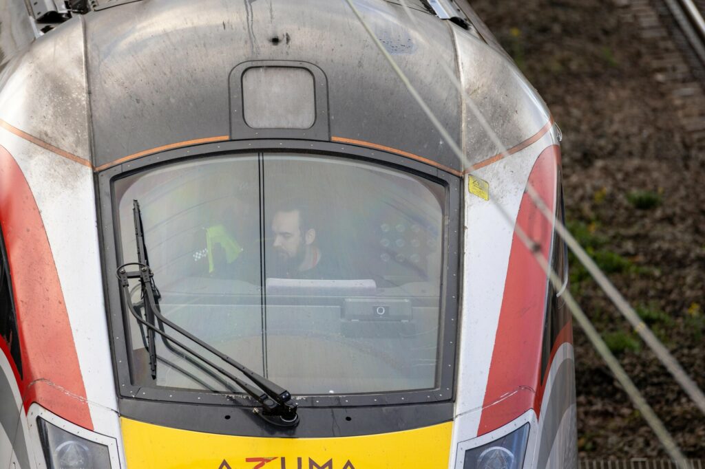 Police at the scene of last night’s stabbing at Huntingdon rail station. One man has been arrested on suspicion of attempted murder. Image: Terry Harris