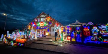 Couple are first in Britain to switch on Christmas lights