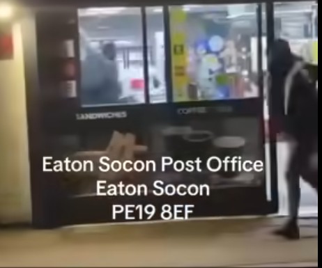 “Look at these lots, robbing post office, getting everything taking all the alcohol and lot” says an onlooker as he filmed outside Eaton Socon post office and Premier store, Eaton Socon, Cambridgeshire. His video has been seen 12,000 times on Facebook.