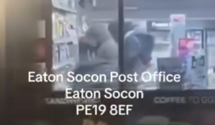 “Look at these lots, robbing post office, getting everything taking all the alcohol and lot” says an onlooker as he filmed outside Eaton Socon post office and Premier store, Eaton Socon, Cambridgeshire. His video has been seen 12,000 times on Facebook.