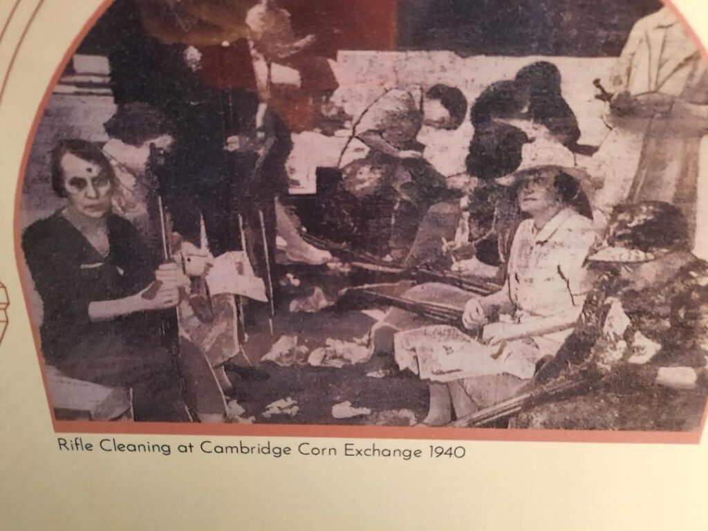 Visit the Cambridge Corn Exchange 150th anniversary exhibition, featuring historic artefacts, digital displays and stories from fans, staff and performers. Cleaning Rifles at corn exchange in 1940
