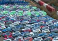 Motorists travelling along the A605 have reported seeing row after row of vehicles stored in the open, with aerial photographs showing what appears to be a substantial holding area for Zipcar-branded cars and vans. PHOTO: Terry Harris