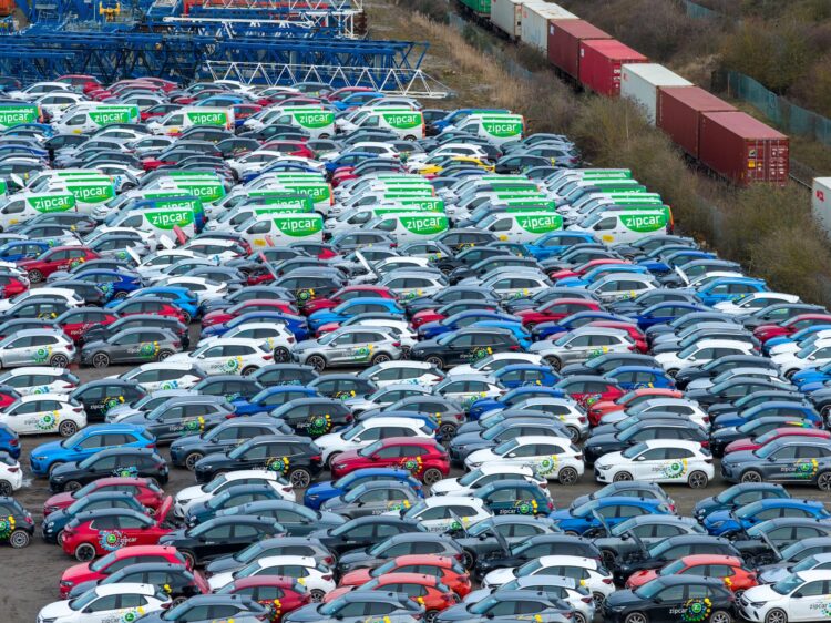 Motorists travelling along the A605 have reported seeing row after row of vehicles stored in the open, with aerial photographs showing what appears to be a substantial holding area for Zipcar-branded cars and vans. PHOTO: Terry Harris