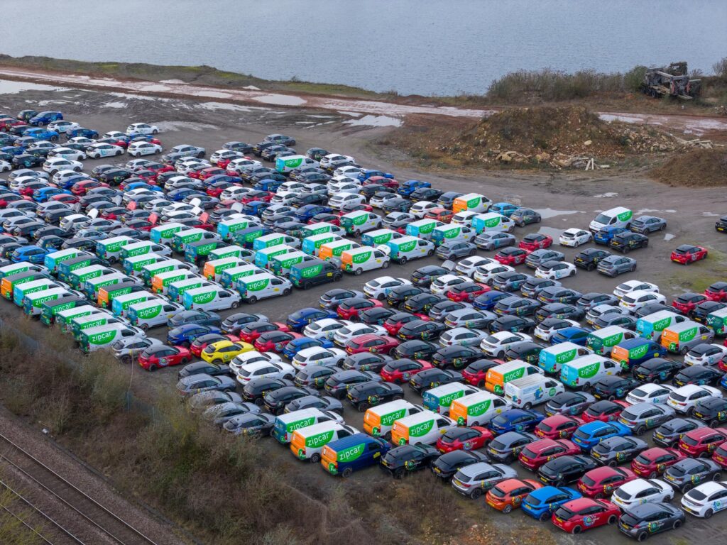 Motorists travelling along the A605 have reported seeing row after row of vehicles stored in the open, with aerial photographs showing what appears to be a substantial holding area for Zipcar-branded cars and vans. PHOTO: Terry Harris