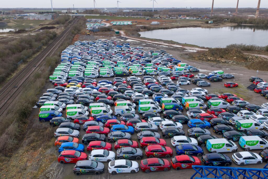 Motorists travelling along the A605 have reported seeing row after row of vehicles stored in the open, with aerial photographs showing what appears to be a substantial holding area for Zipcar-branded cars and vans. PHOTO: Terry Harris