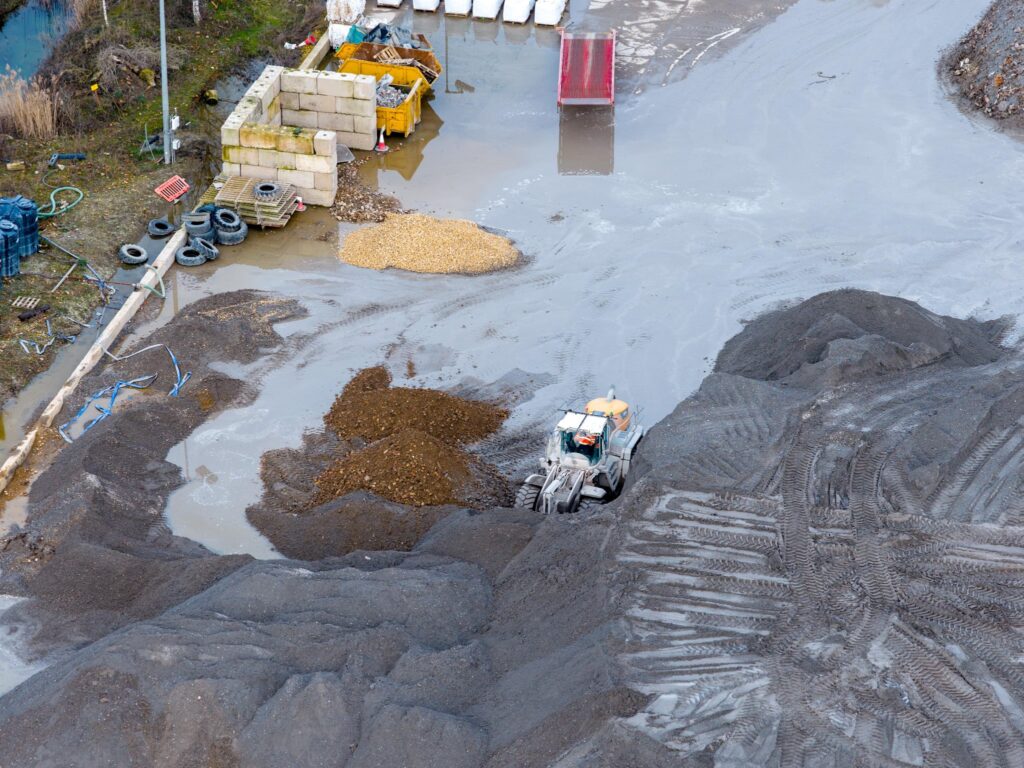 This is the trommel which processes IBA into building 1. The photo shows steam and the material remains hot due to chemical activity. If dust never occurs during this process what is the discolouration on the solar panels. Former Saxon brickworks site, Whittlesey. PHOTO: Terry Harris February 17th, 2026