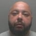 Custody image of Kosta Dimitrov, 36, of Lincoln Road, Millfield, Peterborough, who was found guilty of grievous bodily harm and jailed at Peterborough Crown Court on Monday (23 February).