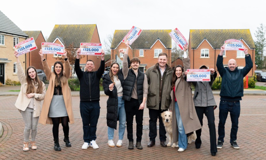 STREET PARTY: Eight neighbours on the Sutton street celebrated sharing £1m prize