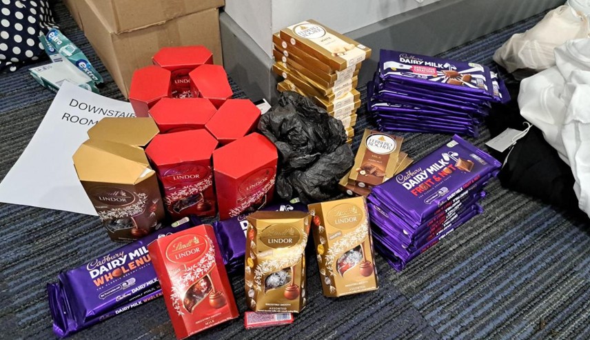 Police recover nearly 3,000 stolen chocolate and confectionery items worth over £7,000 in Fenstanton. Edgware couple arrested and bailed with restrictions in Cambridgeshire. Photos of goods seized by Cambridgeshire Police