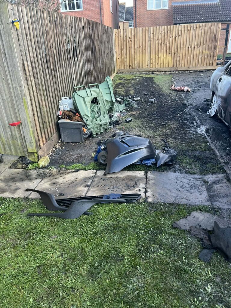 Damage to Charlotte Bessey’s home and vehicles on John Bends Way, Parson Drove, after a fire started from hot ashes in a wheelie bin