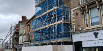 Image above from Fenland District Council: The scaffold-clad former Franks butchers, at 10 Market Place, Wisbech (February 2026)