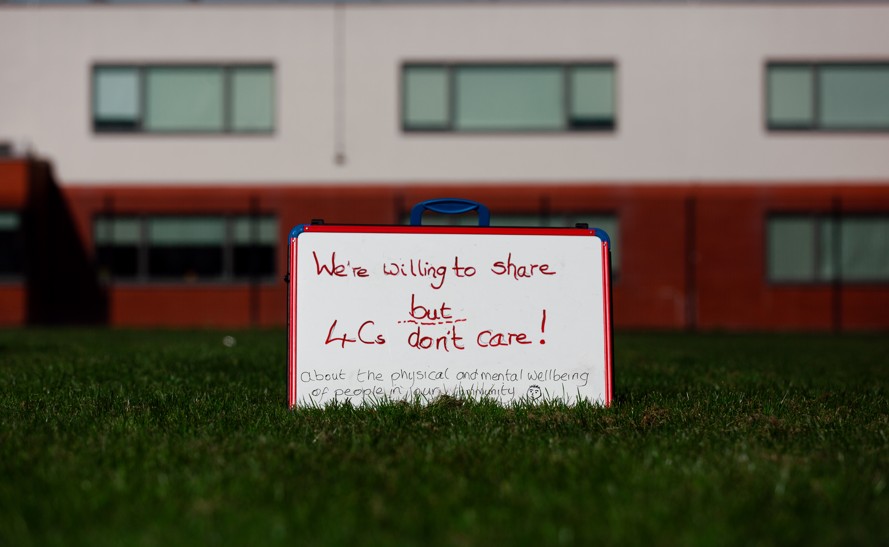 Supporters of the Save Werrington Fields campaign gather in large numbers on Saturday, calling on Peterborough City Council to delay its decision and reopen transparent talks over the future of the community green space. PHOTO: John Wallis