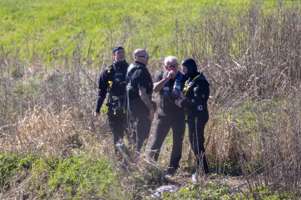Emergency services at the scene on North Brink in Wisbech this morning as search efforts continue after a car entered the River Nene. PHOTO: Terry Harris 