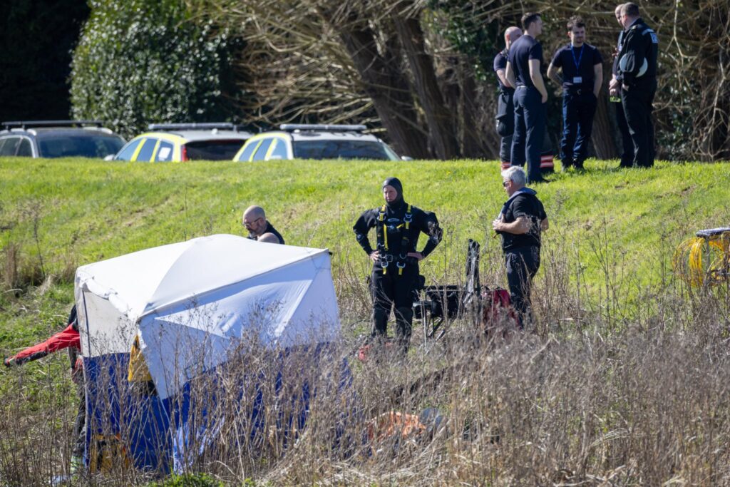 Emergency services at the scene on North Brink in Wisbech this morning as search efforts continue after a car entered the River Nene. PHOTO: Terry Harris