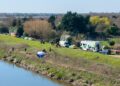 Emergency services at the scene on North Brink in Wisbech this morning as search efforts continue after a car entered the River Nene. PHOTO: Terry Harris