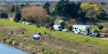 Emergency services at the scene on North Brink in Wisbech this morning as search efforts continue after a car entered the River Nene. PHOTO: Terry Harris