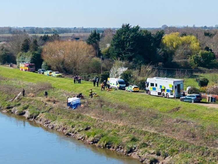 Emergency services at the scene on North Brink in Wisbech this morning as search efforts continue after a car entered the River Nene. PHOTO: Terry Harris