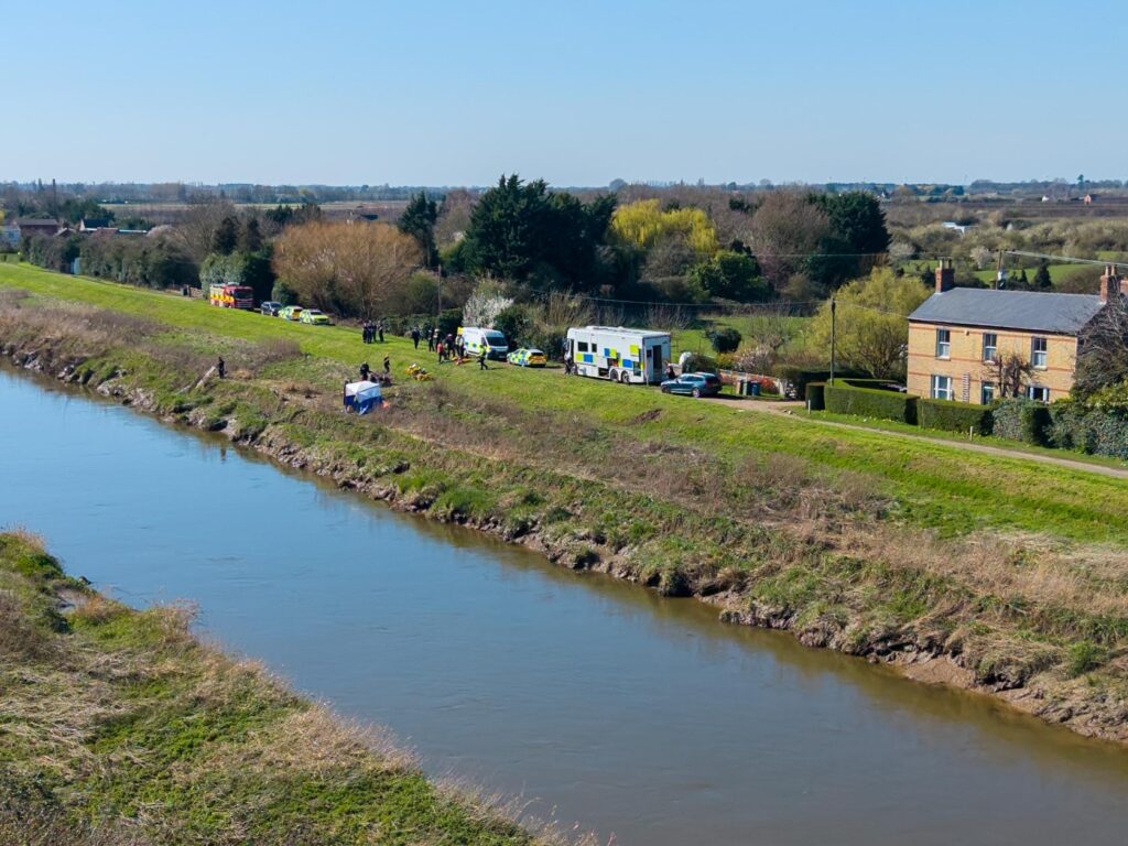 Emergency services at the scene on North Brink in Wisbech this morning as search efforts continue after a car entered the River Nene. PHOTO: Terry Harris