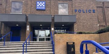 Thorpe Wood Police Station in Peterborough, where a 66-year-old man arrested on suspicion of fraud and misconduct in public office in December 2025 was taken into custody before being released on bail, now extended until June 2026.