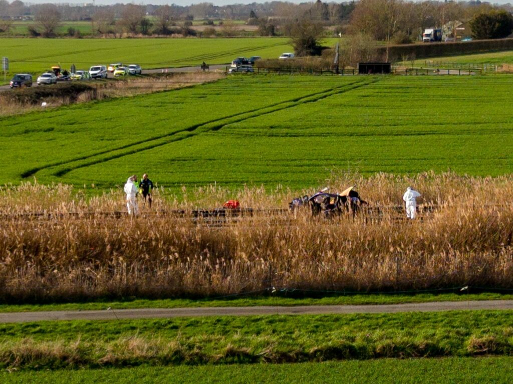 A person has died after a train struck a car at Dimmocks Cote level crossing near Ely, Cambridgeshire. Rail services are suspended; passengers advised to check journeys. Photo: Terry Harris
