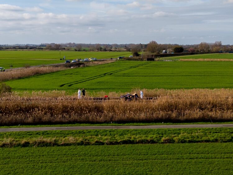 A person has died after a train struck a car at Dimmocks Cote level crossing near Ely, Cambridgeshire. Rail services are suspended; passengers advised to check journeys. Photo: Terry Harris