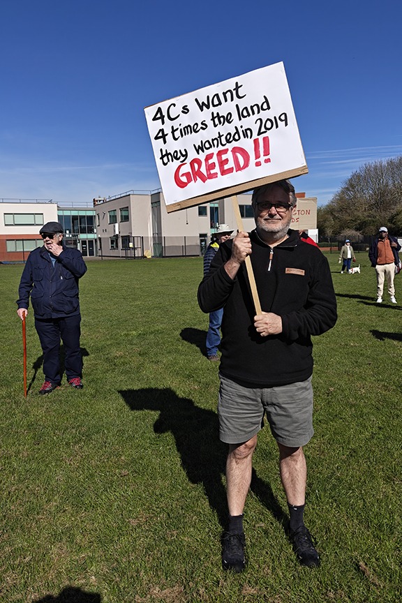 Supporters of the Save Werrington Fields campaign gather in large numbers on Saturday, calling on Peterborough City Council to delay its decision and reopen transparent talks over the future of the community green space. PHOTO: Paul Saunders