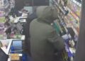 CCTV image taken from police YouTube footage shows masked raiders entering the Post Office and Premier Store in Eaton Socon, St Neots, moments before the burglary.