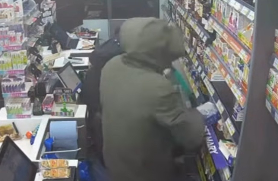 CCTV image taken from police YouTube footage shows masked raiders entering the Post Office and Premier Store in Eaton Socon, St Neots, moments before the burglary.