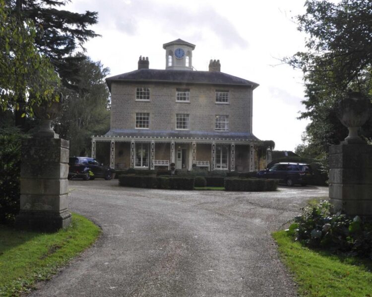 Stibbington House, a Grade II listed property on Elton Road, Wansford, pictured with its surrounding grounds. The photographs were submitted as part of a planning application and are publicly available via Huntingdonshire District Council’s online planning portal.