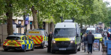 • Police vans equipped with live facial recognition technology stationed in Peterborough city centre. Photo: Terry Harris/CambsNews