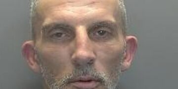 Custody photo of Carl Scarrow, who has been jailed after driving at a police officer during an attempt to evade arrest. Photo: Cambridgeshire Constabulary