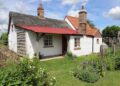 Fen Cottage in spring at Wicken Fen National Nature Reserve © National Trust Images Mike Selby
