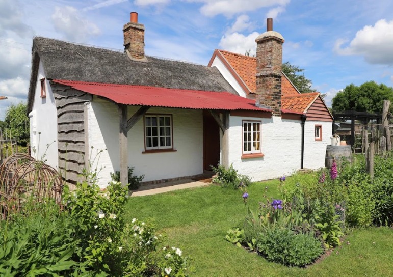Fen Cottage in spring at Wicken Fen National Nature Reserve © National Trust Images Mike Selby
