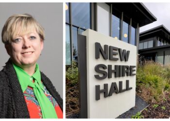 Dame Jackie Doyle-Price pictured alongside Shire Hall as she launches her bid to represent Roman Bank & Peckover on Cambridgeshire County Council. IMAGE: Parliament website and Terry Harris
