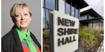 Dame Jackie Doyle-Price pictured alongside Shire Hall as she launches her bid to represent Roman Bank & Peckover on Cambridgeshire County Council. IMAGE: Parliament website and Terry Harris