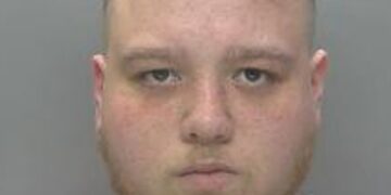 Levi George in custody following his arrest during a county lines drugs raid in Brampton. Photo: Cambridgeshire Constabulary.